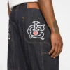 Pantaloni da carpentiere in denim selvedge con Running Dog che corre