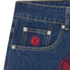 Pantaloni in denim con Running Dog che corre in cristalli